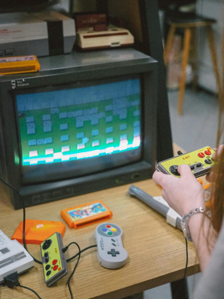 A nostalgic glimpse into retro gaming featuring a classic console and vintage monitor setup.